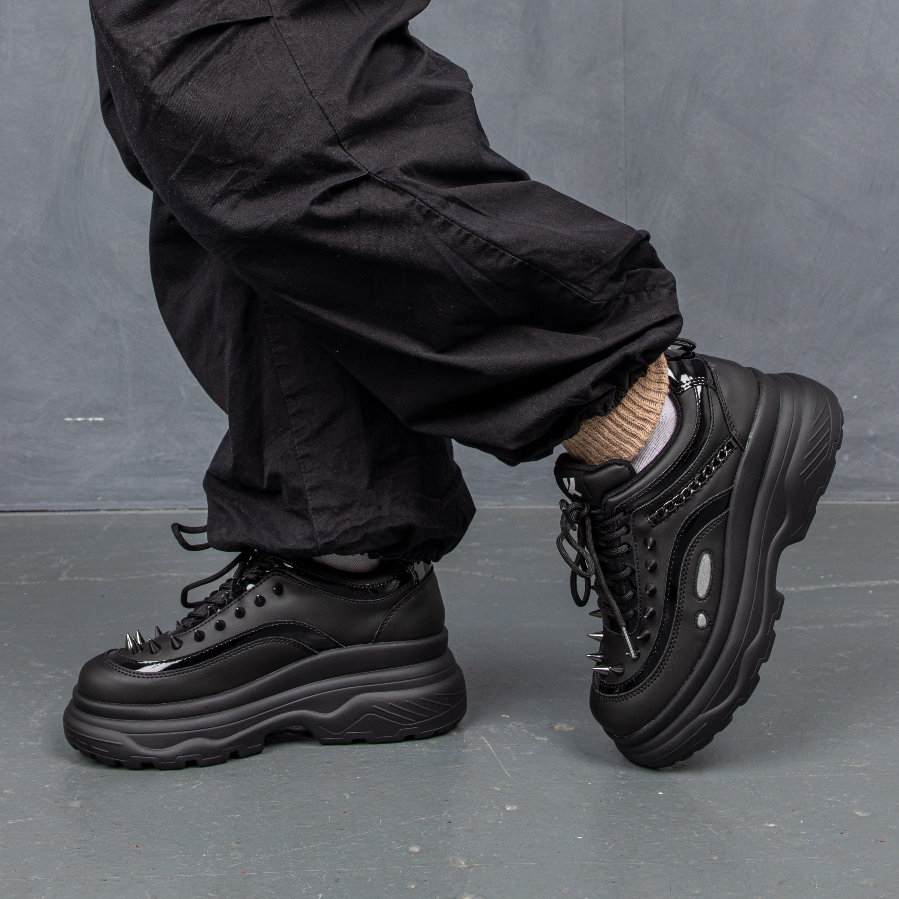 BANE OF EXILE TRAINERS - Trainers - KOI Footwear - Black - Model Left View